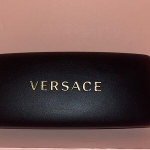Versace sunglasses case.